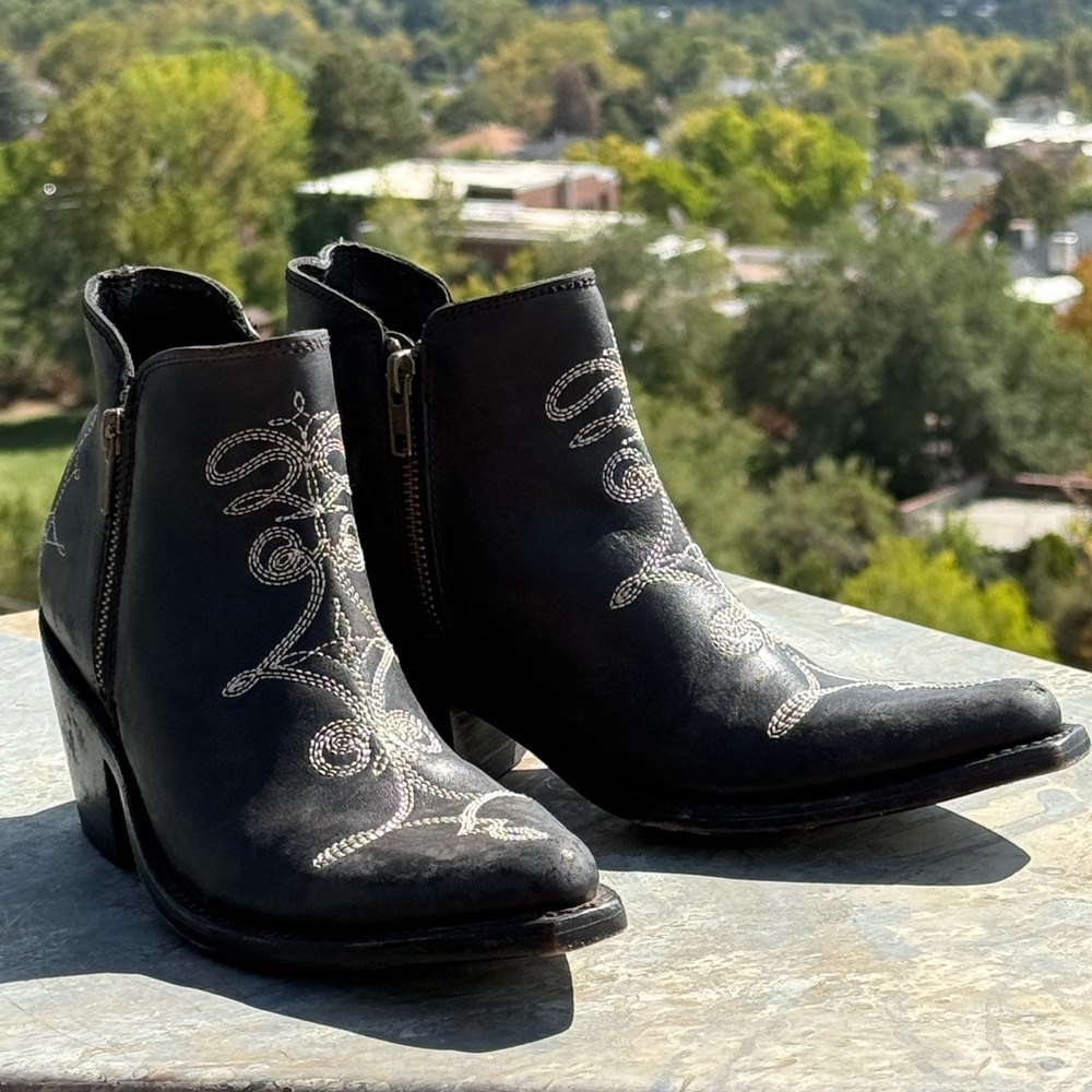 Liberty Black embroidered ankle boots in black distressed leather.